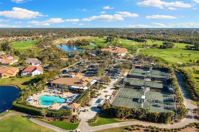 drone / aerial view featuring a water view and view of golf course