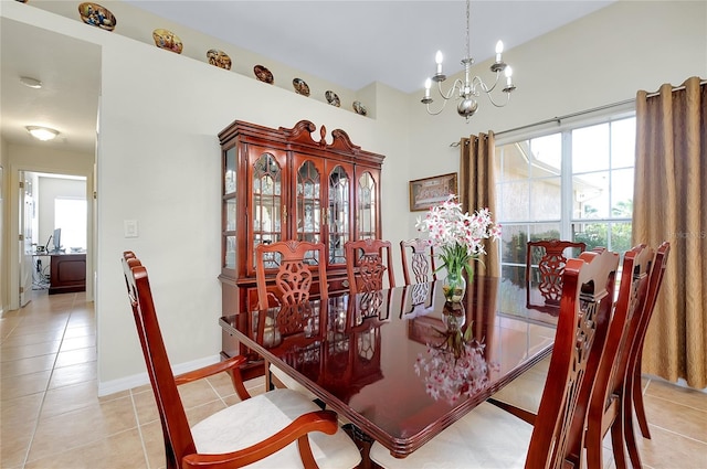 13452 High Springs Ave, Port Charlotte, FL 33981 - dining space with a chandelier and light tile patterned floors