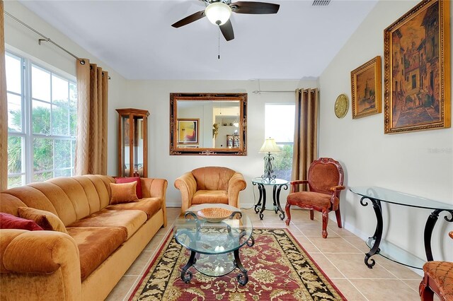 13452 High Springs Ave, Port Charlotte, FL 33981 - living room with light tile patterned flooring and ceiling fan