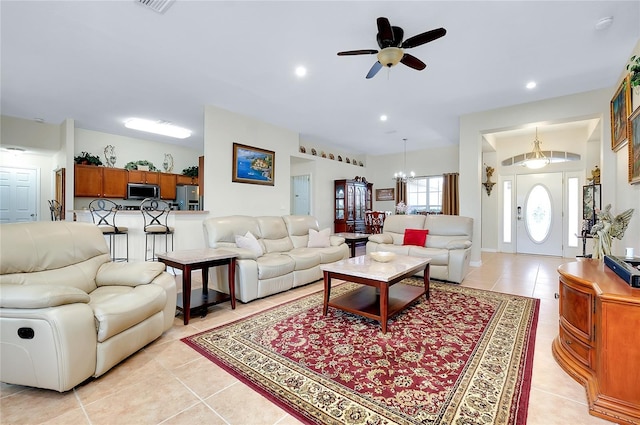 13452 High Springs Ave, Port Charlotte, FL 33981 - living area with a ceiling fan, light tile patterned flooring, a chandelier, and recessed lighting