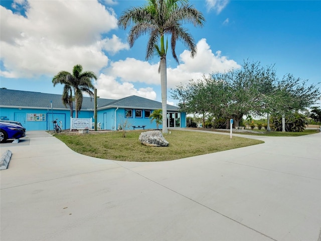 13452 High Springs Ave, Port Charlotte, FL 33981 - view of front facade featuring concrete driveway and a front yard