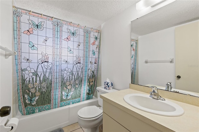 full bath featuring tile patterned flooring, vanity, toilet, a textured ceiling, and shower / bath combination with curtain