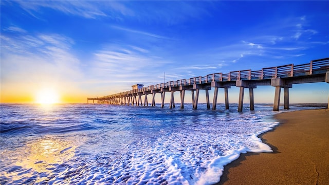 dock area with a pier and a water view