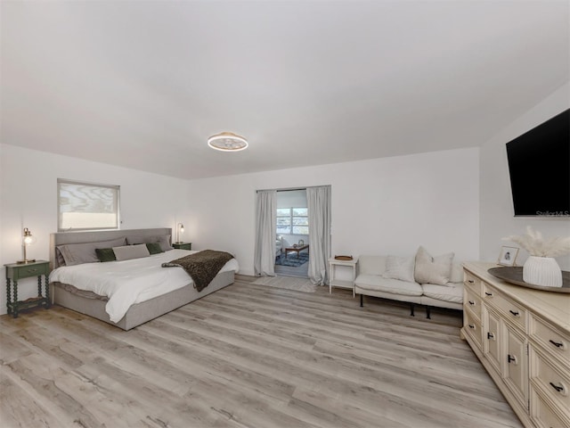 bedroom featuring light wood finished floors