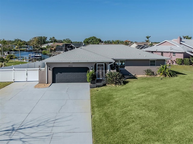 ranch-style home with a gate, fence, a garage, a front lawn, and stucco siding