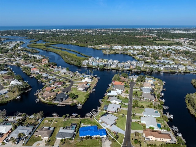 aerial view featuring a water view and a residential view