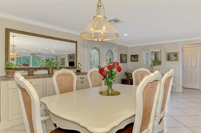 403 Picasso Dr, Nokomis, FL 34275 - dining room featuring light tile patterned flooring, visible vents, crown molding, recessed lighting, and a notable chandelier