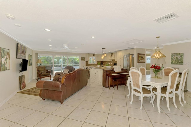 403 Picasso Dr, Nokomis, FL 34275 - living area featuring visible vents, recessed lighting, ornamental molding, and light tile patterned floors