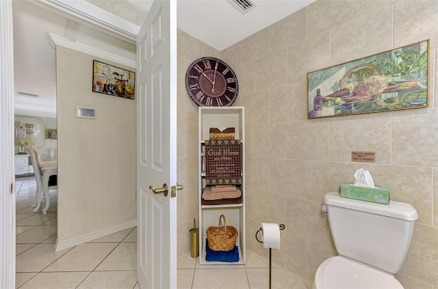 403 Picasso Dr, Nokomis, FL 34275 - bathroom featuring visible vents, toilet, tile patterned flooring, and tile walls