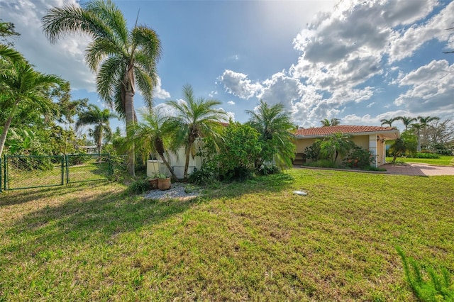 403 Picasso Dr, Nokomis, FL 34275 - view of yard with a gate and fence