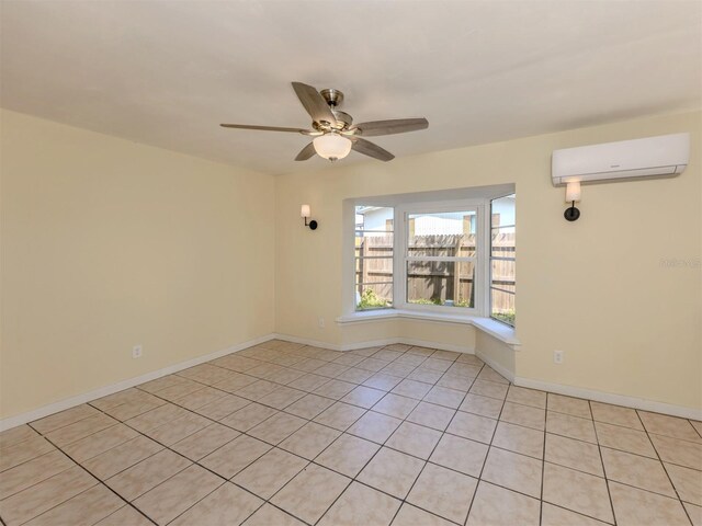 200 Sierra St S, Nokomis, FL 34275 - unfurnished room with baseboards, ceiling fan, and an AC wall unit