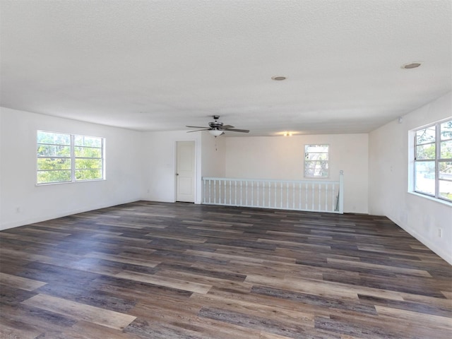 200 Sierra St S, Nokomis, FL 34275 - spare room featuring a healthy amount of sunlight, ceiling fan, and wood finished floors