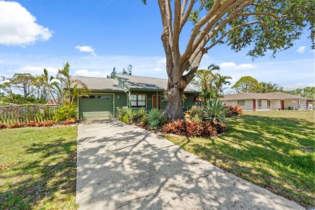 888 Kimball Rd, Venice, FL 34293 - ranch-style house featuring driveway, a front yard, and a garage