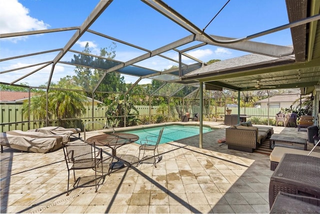888 Kimball Rd, Venice, FL 34293 - view of pool with a lanai, a fenced backyard, a fenced in pool, outdoor lounge area, and a patio area
