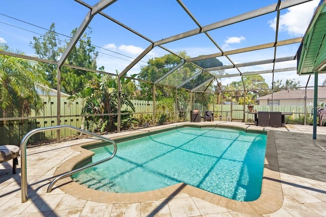 888 Kimball Rd, Venice, FL 34293 - view of swimming pool featuring a fenced backyard, a lanai, a patio, and a fenced in pool