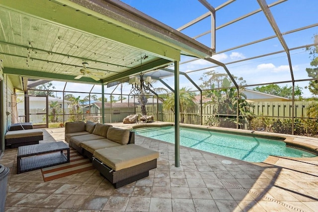 888 Kimball Rd, Venice, FL 34293 - pool with fence, a lanai, a patio, a ceiling fan, and an outdoor living space