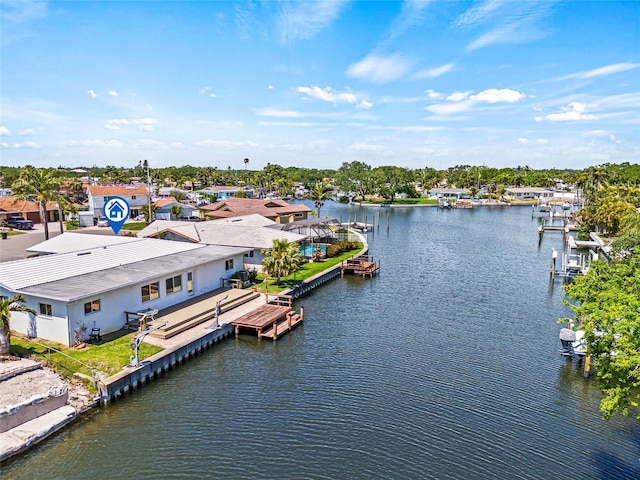 aerial view featuring a residential view and a water view