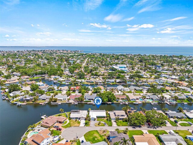 bird's eye view with a residential view and a water view
