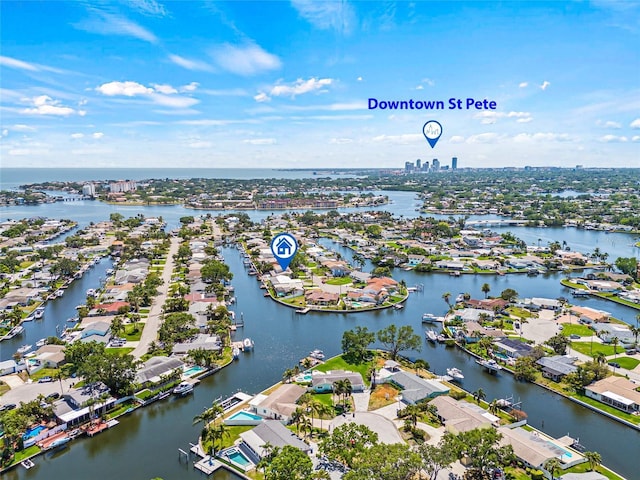 bird's eye view with a water view and a residential view