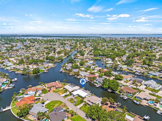 aerial view with a residential view and a water view