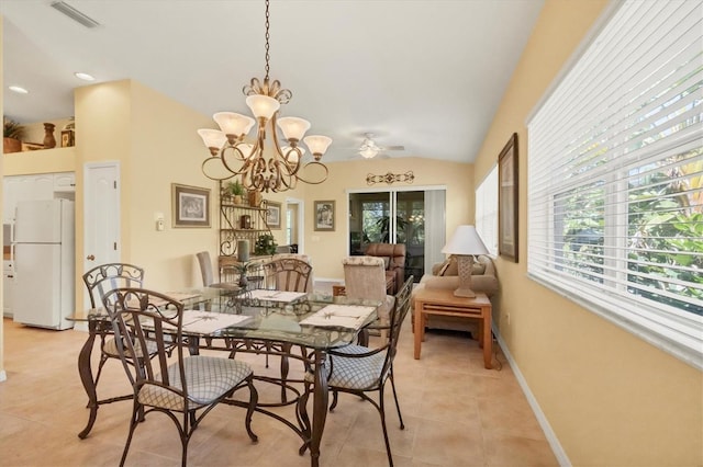 121 Auburn Woods Cir, Venice, FL 34292 - dining area with vaulted ceiling, light tile patterned floors, ceiling fan with notable chandelier, baseboards, and visible vents