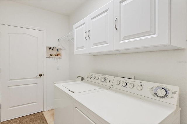 121 Auburn Woods Cir, Venice, FL 34292 - washroom featuring cabinet space and separate washer and dryer