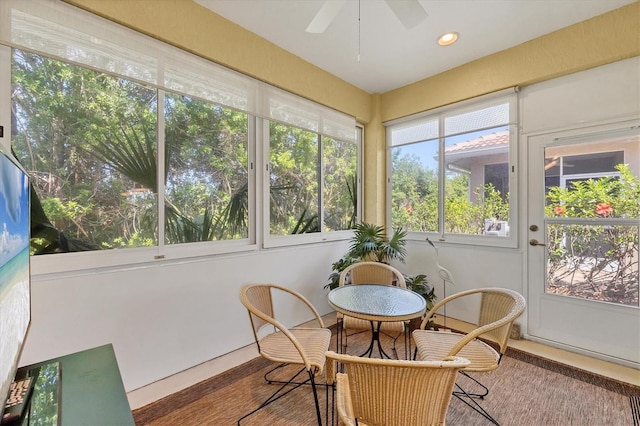 121 Auburn Woods Cir, Venice, FL 34292 - sunroom / solarium featuring outdoor dining space and ceiling fan