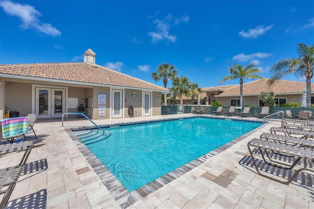 121 Auburn Woods Cir, Venice, FL 34292 - pool with a patio, fence, and french doors