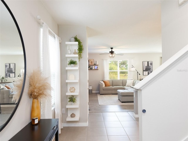 4907 Wedgeleaf Way, Palmetto, FL 34221 - foyer entrance with a ceiling fan, baseboards, and light tile patterned floors