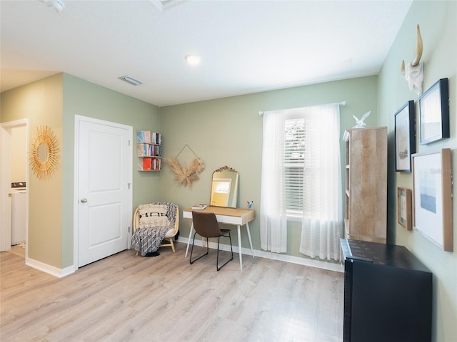 4907 Wedgeleaf Way, Palmetto, FL 34221 - office with baseboards, visible vents, and wood finished floors