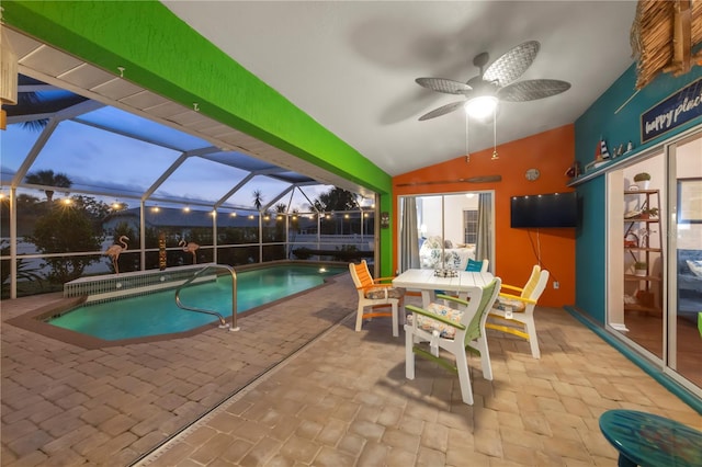 4305 Sandune Ave, North Port, FL 34287 - swimming pool with a patio area, ceiling fan, outdoor dining area, and glass enclosure