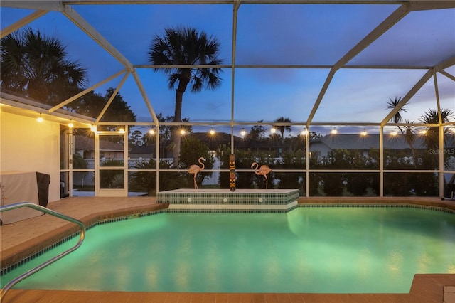 4305 Sandune Ave, North Port, FL 34287 - swimming pool with glass enclosure and a patio