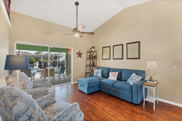 4305 Sandune Ave, North Port, FL 34287 - living area with wood finished floors, baseboards, high vaulted ceiling, and a ceiling fan