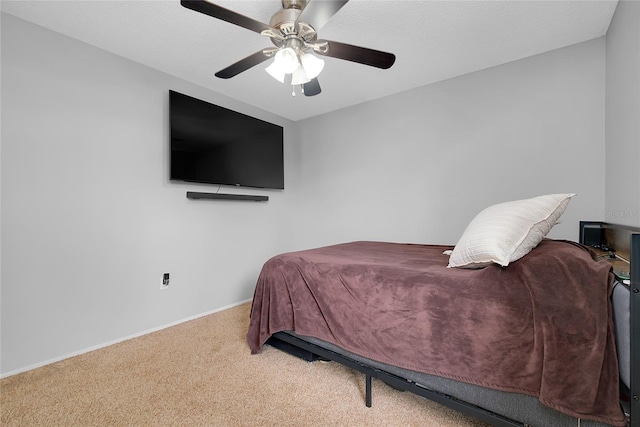 4068 Palau Dr, Sarasota, FL 34241 - bedroom with carpet flooring and ceiling fan