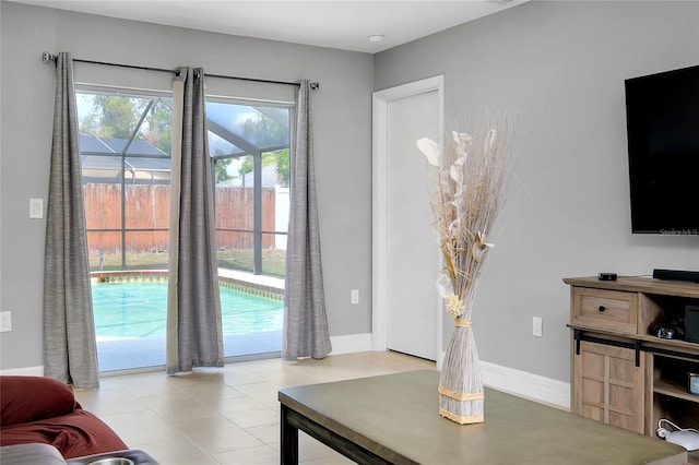 4068 Palau Dr, Sarasota, FL 34241 - living area featuring light tile patterned floors and baseboards