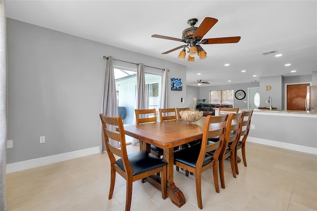 4068 Palau Dr, Sarasota, FL 34241 - dining room with ceiling fan, recessed lighting, and light tile patterned flooring
