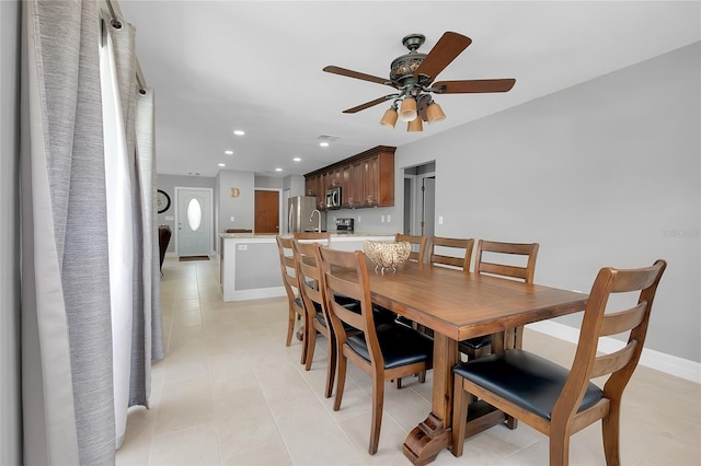 4068 Palau Dr, Sarasota, FL 34241 - dining room featuring ceiling fan, recessed lighting, and light tile patterned floors
