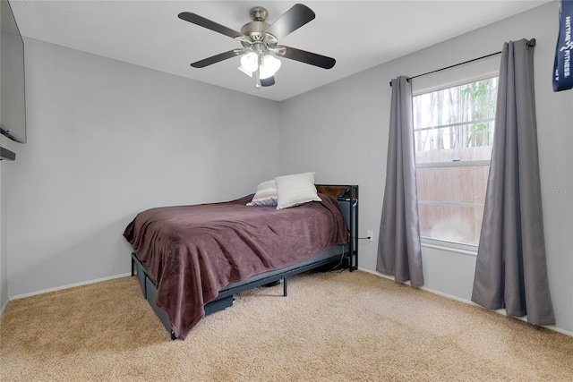 4068 Palau Dr, Sarasota, FL 34241 - carpeted bedroom with ceiling fan and baseboards