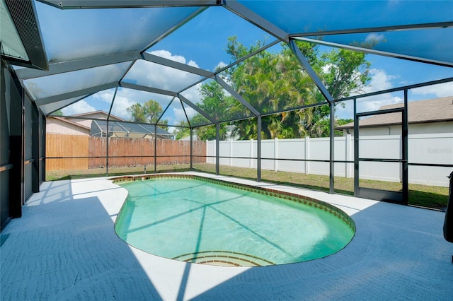 4068 Palau Dr, Sarasota, FL 34241 - view of pool with a fenced backyard, a patio, and a lanai