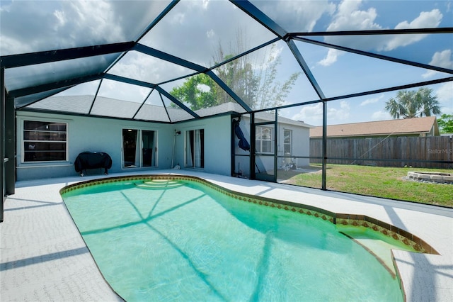 4068 Palau Dr, Sarasota, FL 34241 - view of pool with a patio area, grilling area, and glass enclosure