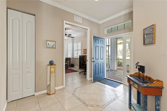 1625 Lancashire Dr, Venice, FL 34293 - foyer entrance with baseboards, light tile patterned floors, crown molding, visible vents, and ceiling fan