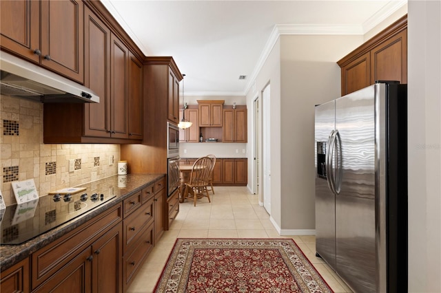 1625 Lancashire Dr, Venice, FL 34293 - kitchen with light tile patterned floors, ornamental molding, appliances with stainless steel finishes, under cabinet range hood, and backsplash