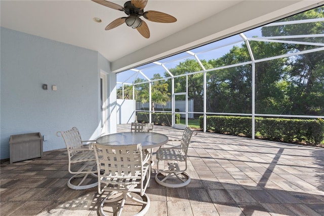 1625 Lancashire Dr, Venice, FL 34293 - view of patio with ceiling fan, glass enclosure, and outdoor dining space