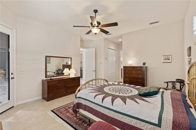 1625 Lancashire Dr, Venice, FL 34293 - bedroom with visible vents, baseboards, a closet, light tile patterned floors, and a ceiling fan
