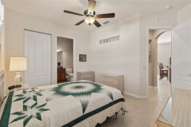 1625 Lancashire Dr, Venice, FL 34293 - bedroom featuring visible vents, baseboards, arched walkways, and light tile patterned flooring