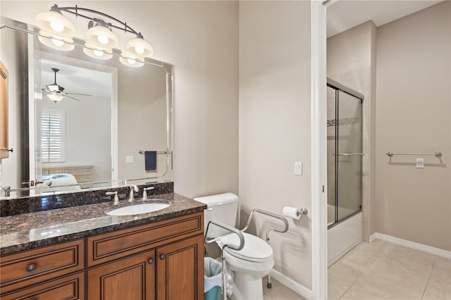 1625 Lancashire Dr, Venice, FL 34293 - ensuite bathroom with ensuite bathroom, vanity, a ceiling fan, toilet, and tile patterned floors