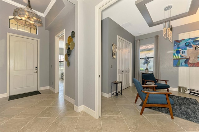 24193 Gallberry Dr, Venice, FL 34293 - entrance foyer featuring light tile patterned flooring, an inviting chandelier, and baseboards