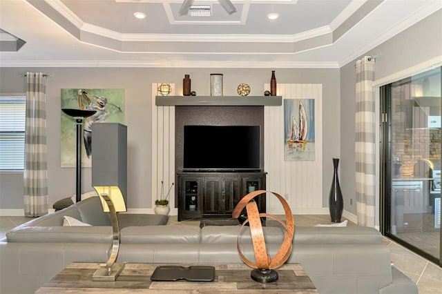 24193 Gallberry Dr, Venice, FL 34293 - tiled living room featuring baseboards, ornamental molding, and a raised ceiling