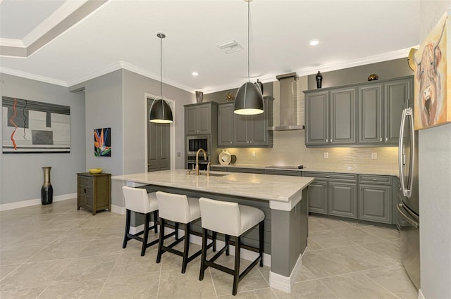 24193 Gallberry Dr, Venice, FL 34293 - kitchen with wall chimney exhaust hood, a sink, ornamental molding, gray cabinets, and decorative backsplash