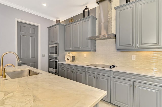 24193 Gallberry Dr, Venice, FL 34293 - kitchen with tasteful backsplash, wall chimney exhaust hood, a sink, stainless steel appliances, and gray cabinets